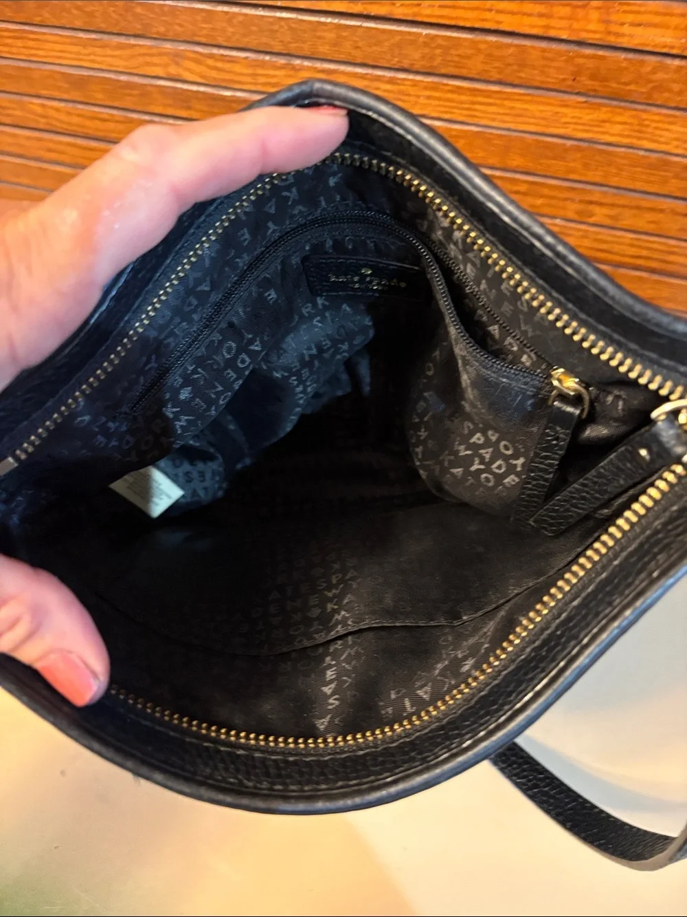 Kate Spade Black Leather Crossbody Bag with Tassel